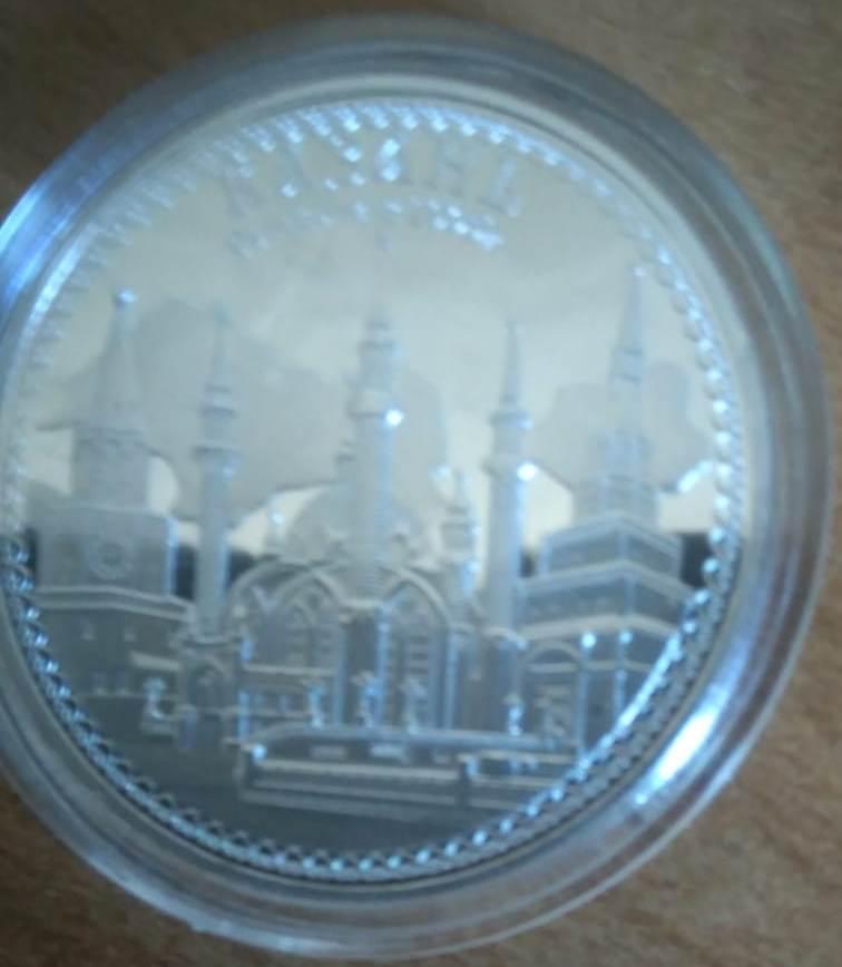 Памятные монеты из Санкт-Петербурга, Казани и Токио (во время принятия Олимпиады 1