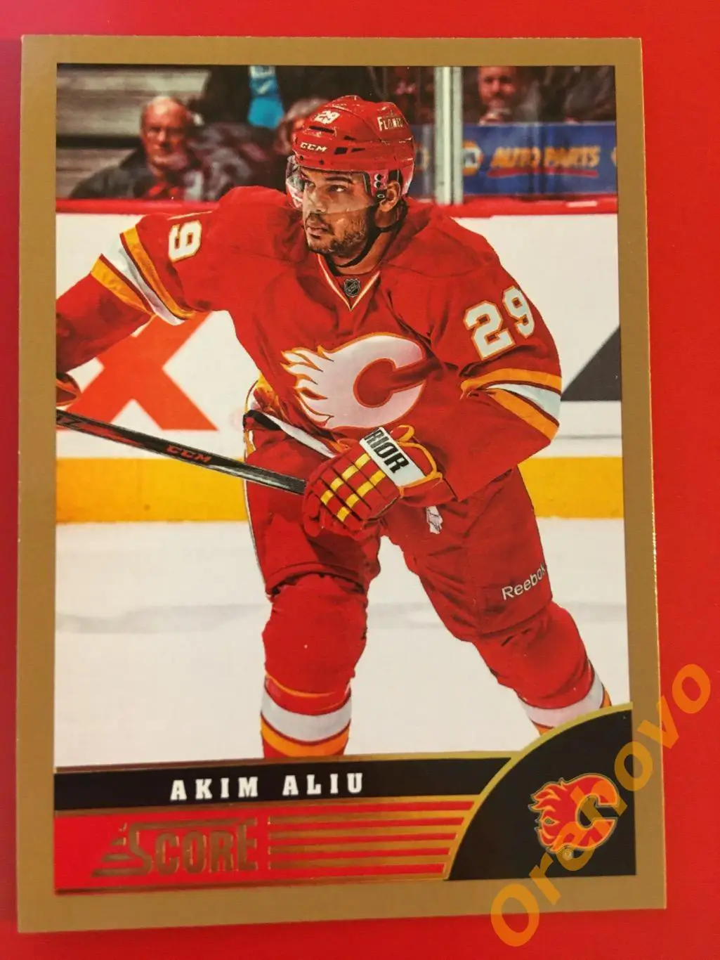 AKIM ALIU Калгари No. 60 gold 2013-14 Score Panini