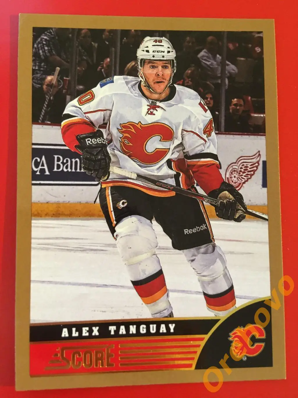 ALEX TANGUAY Калгари No. 61 gold 2013-14 Score Panini