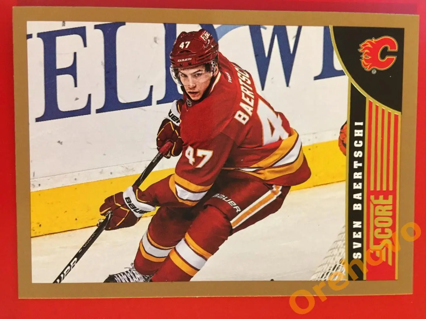 SVEN BAERTSCHI Калгари No. 62 gold 2013-14 Score Panini