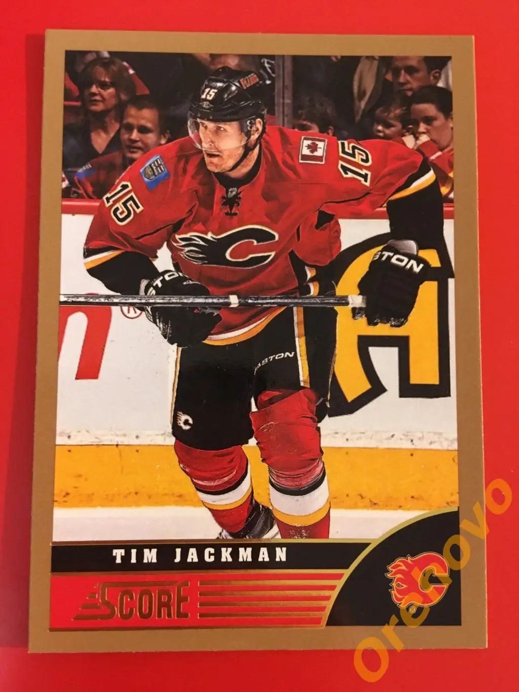 TIM JACKMAN Калгари No. 73 gold 2013-14 Score Panini