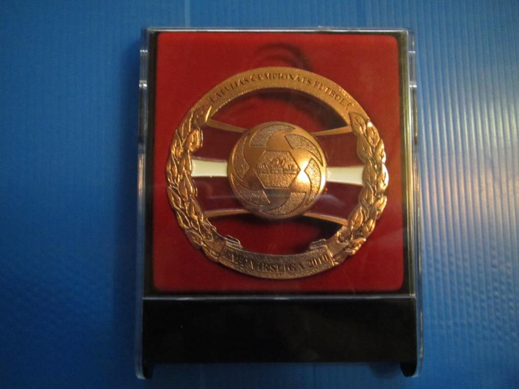 медаль за третье место чемпионата высшей лиги Латвии 2010 года