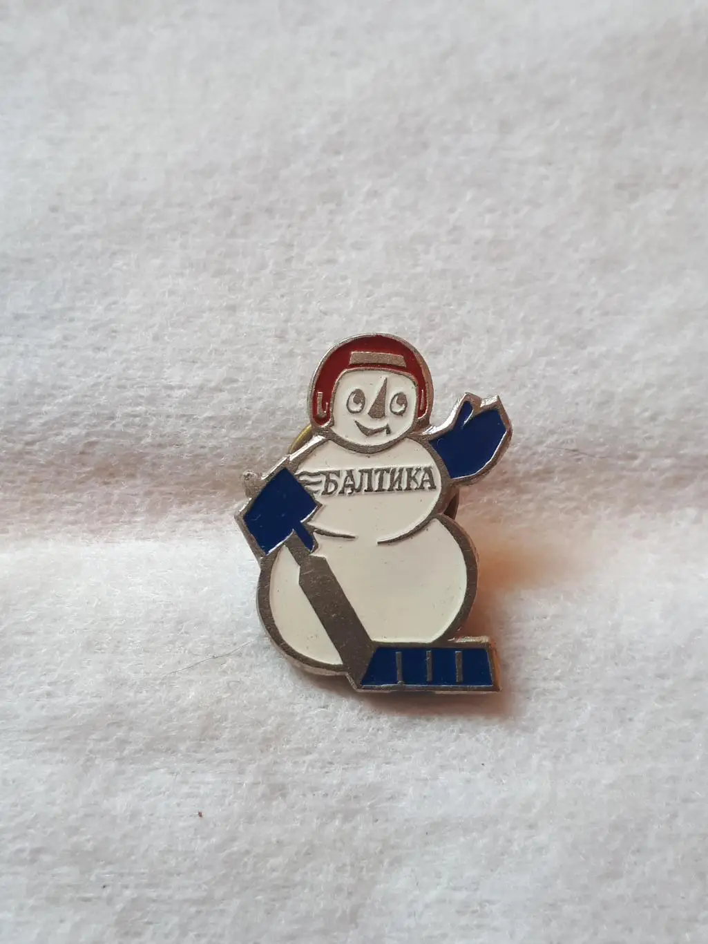 знак снеговик балтика в синих крагах