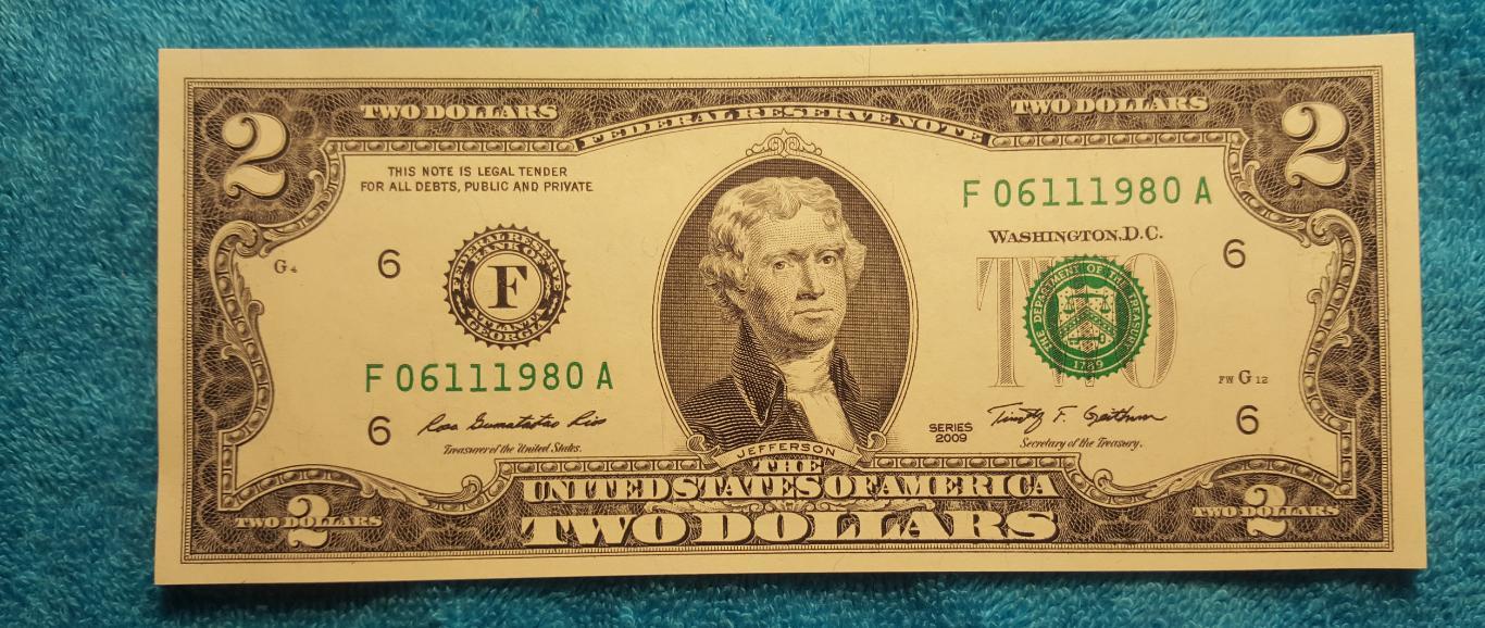 2$ доллара 2009 г. UNC Номер - Год рождения 1980г