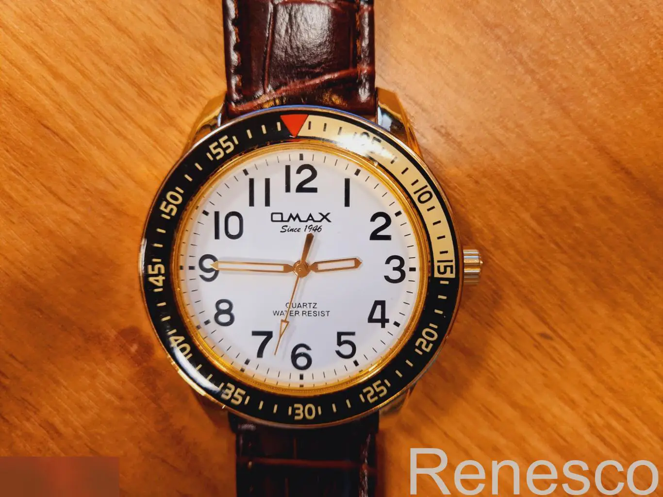 Часы OMAX Quartz Since 1946 c ремешком. Неношенные.