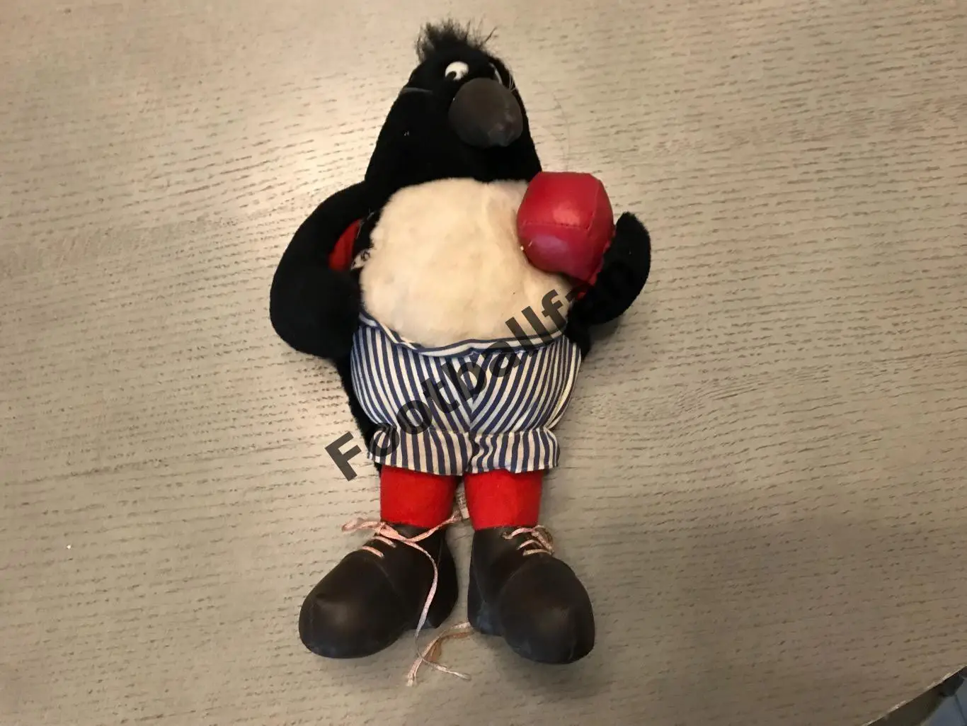 Футболист .