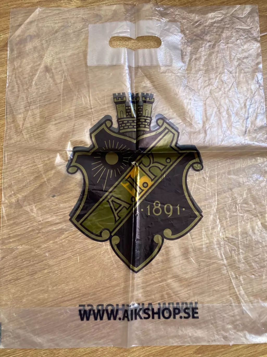 АІК фірмовий пакет