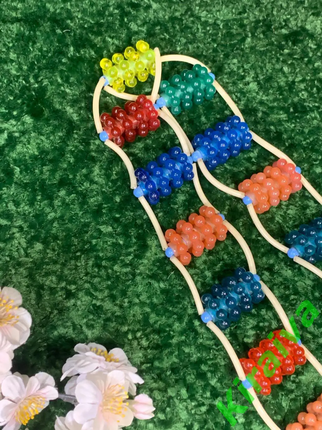 Массажер пластиковы ленточно-роликовый для спины ног тела ребристые шарики н8008 5