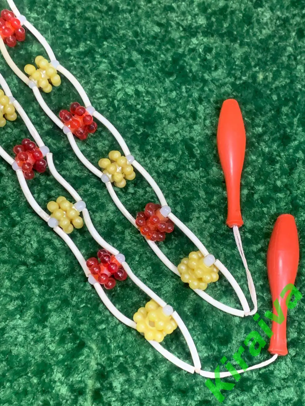 Массажер пластиковый ленточно-роликовый для спины ног тела ребристые шарики 134 7