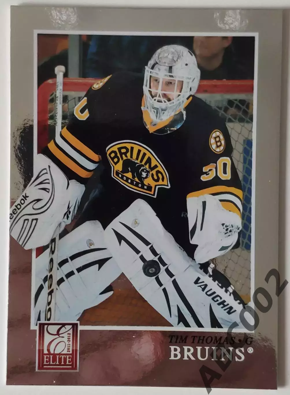 Карточка НХЛ / Tim Thomas / Bruins / Elite