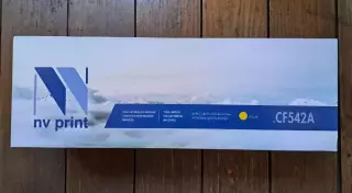 Картридж лазерный NV Print CB542A желтый, с чипом, новый