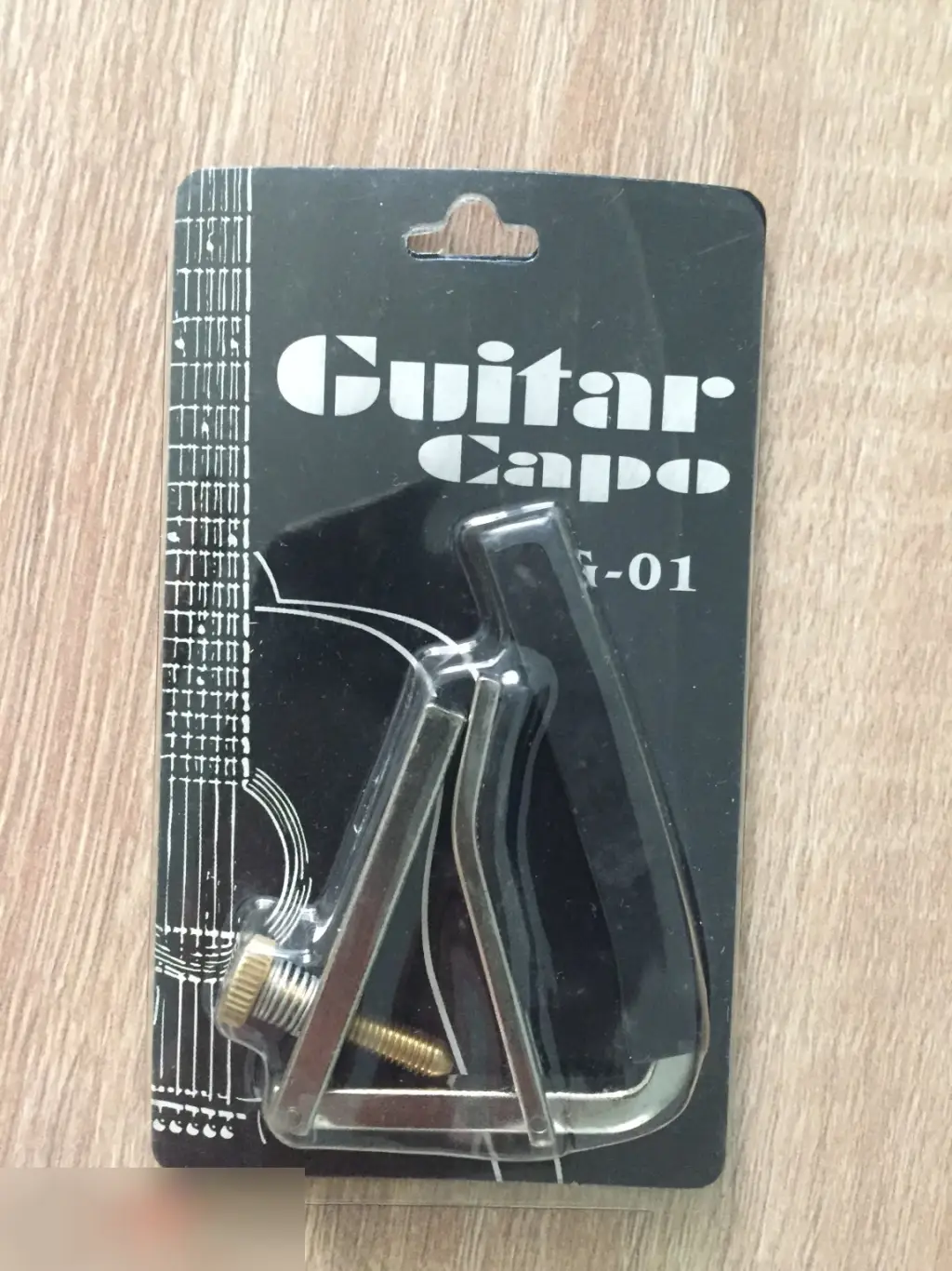 Каподастр для акустической гитары