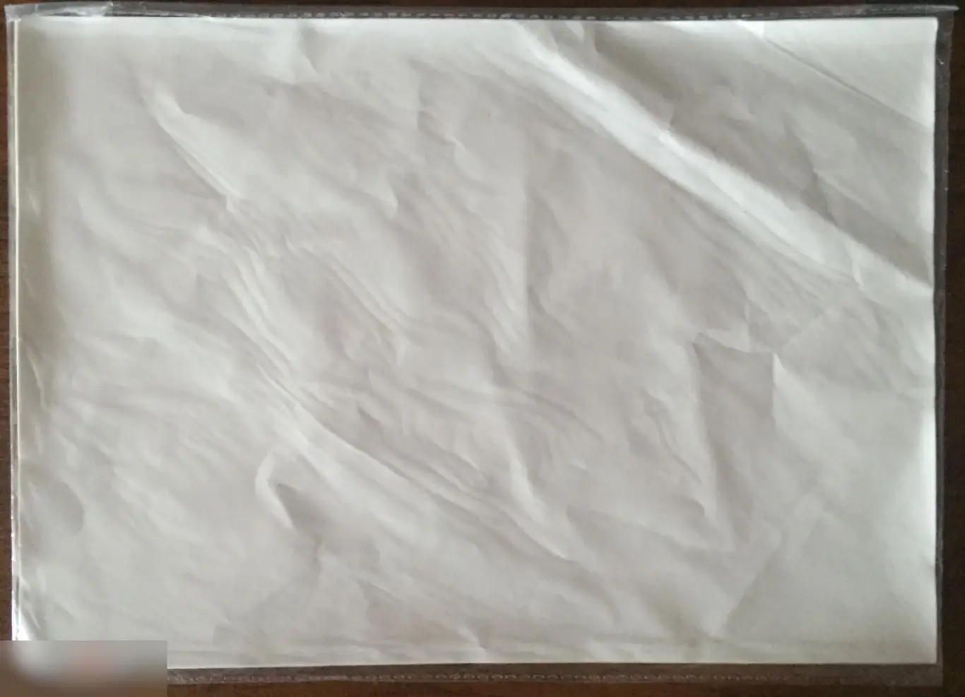 Чистая мятая термонаклейка А4 для переноса рисунка на одежду