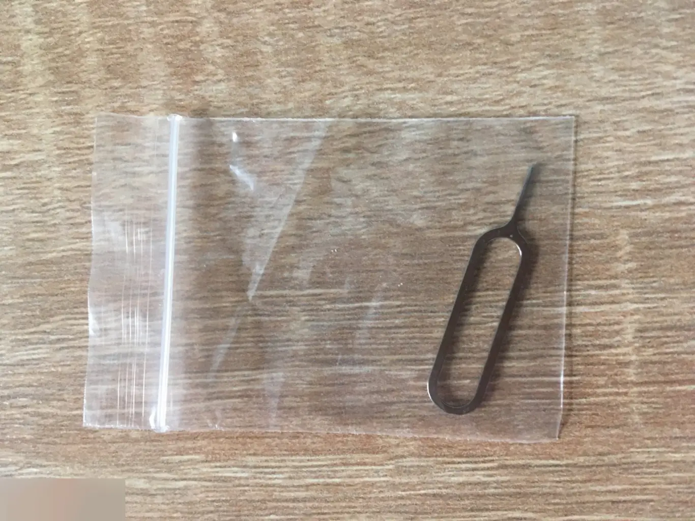 Металлический ключ-скрепка для извлечения sim карты смартфона