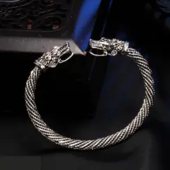 Браслет с головами