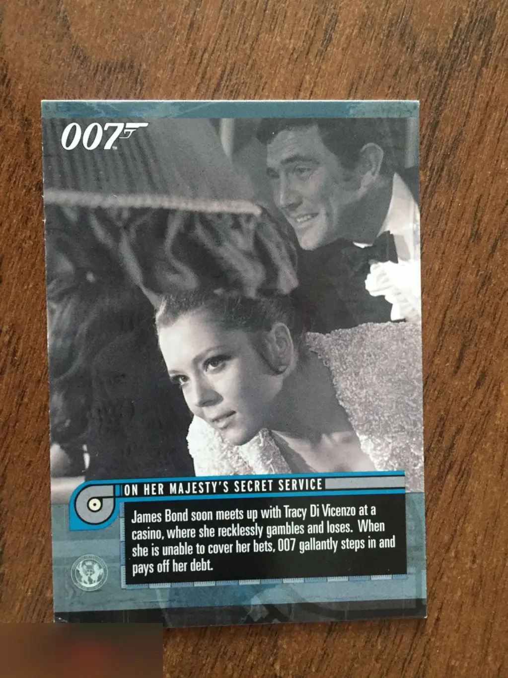 Джордж Лэзенби автограф на карточке Джеймс Бонд 1