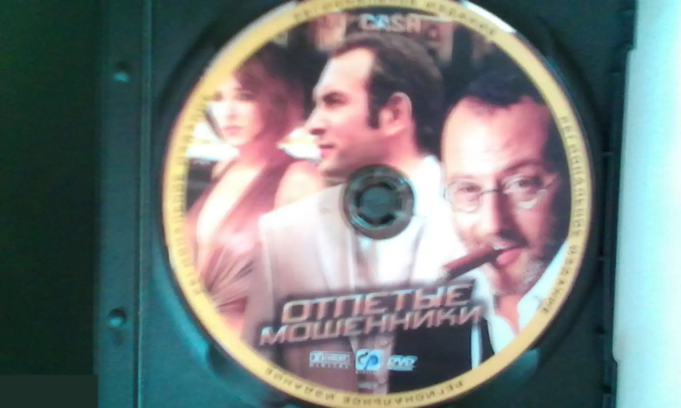 Жан Рено рукописный автограф на DVD Отпетые мошенники 2