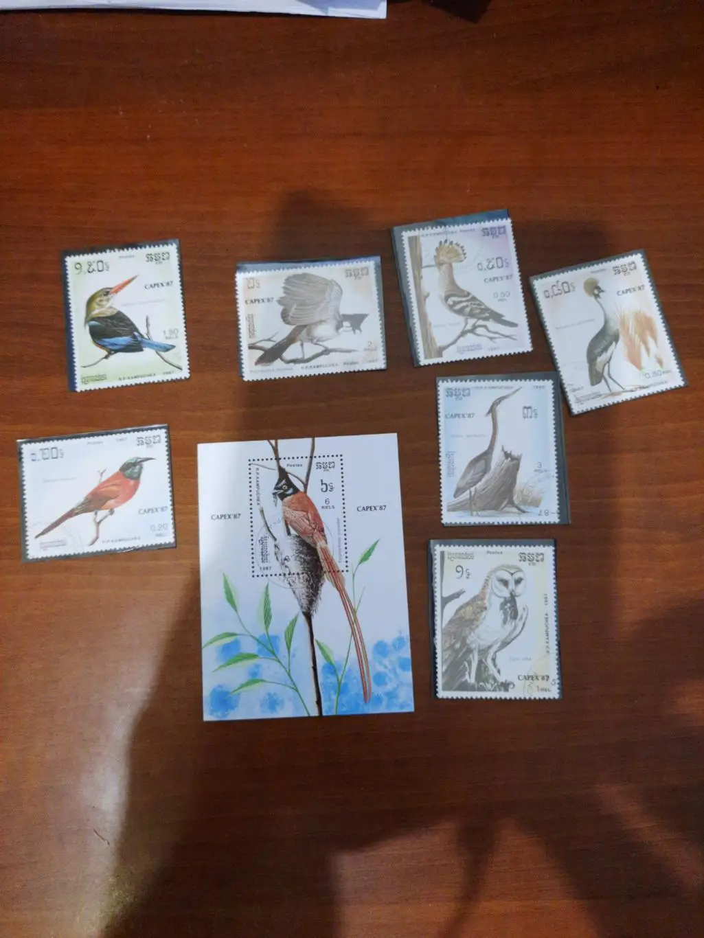 Марки. Кампучия. Птицы