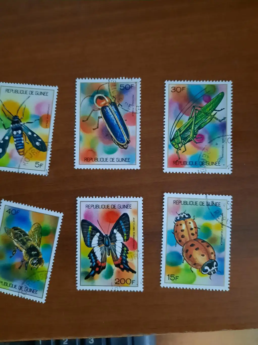 Марки. Гвинея. Насекомые