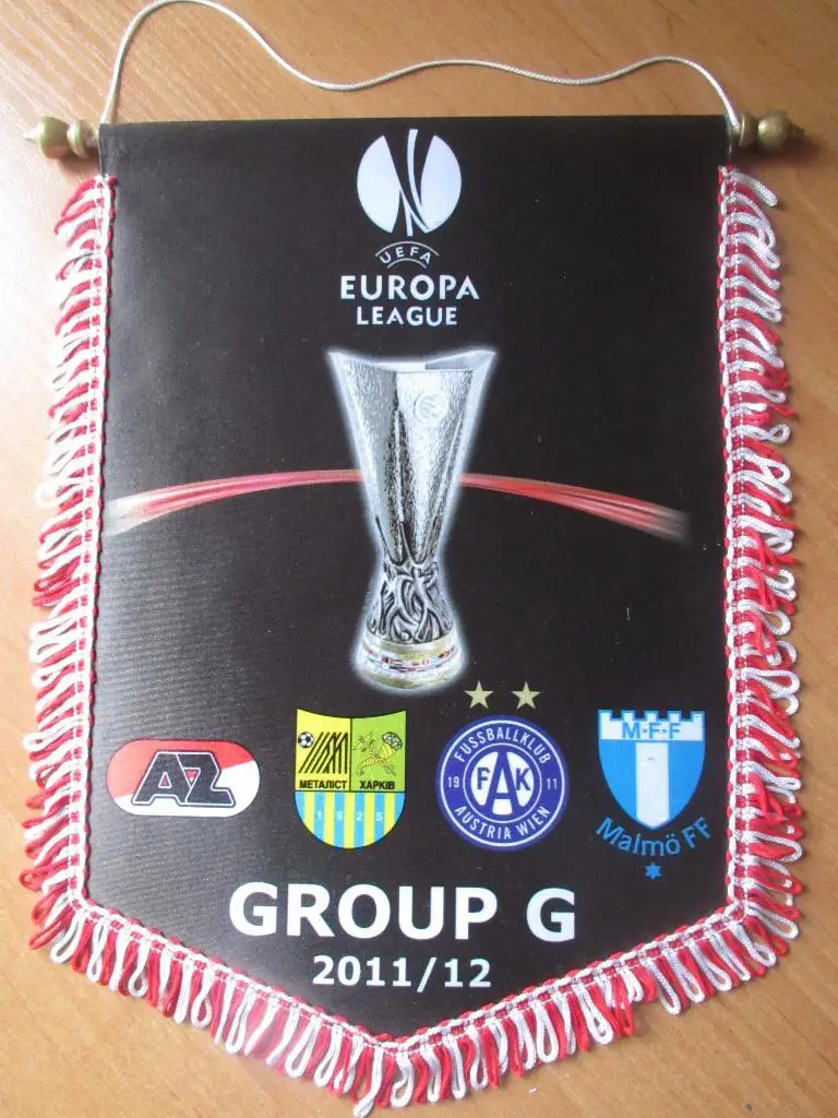 Металлист,АЗ,Мальме,Аустрия - вымпел ФК АЗ на группу ЛЕ 2011/2012