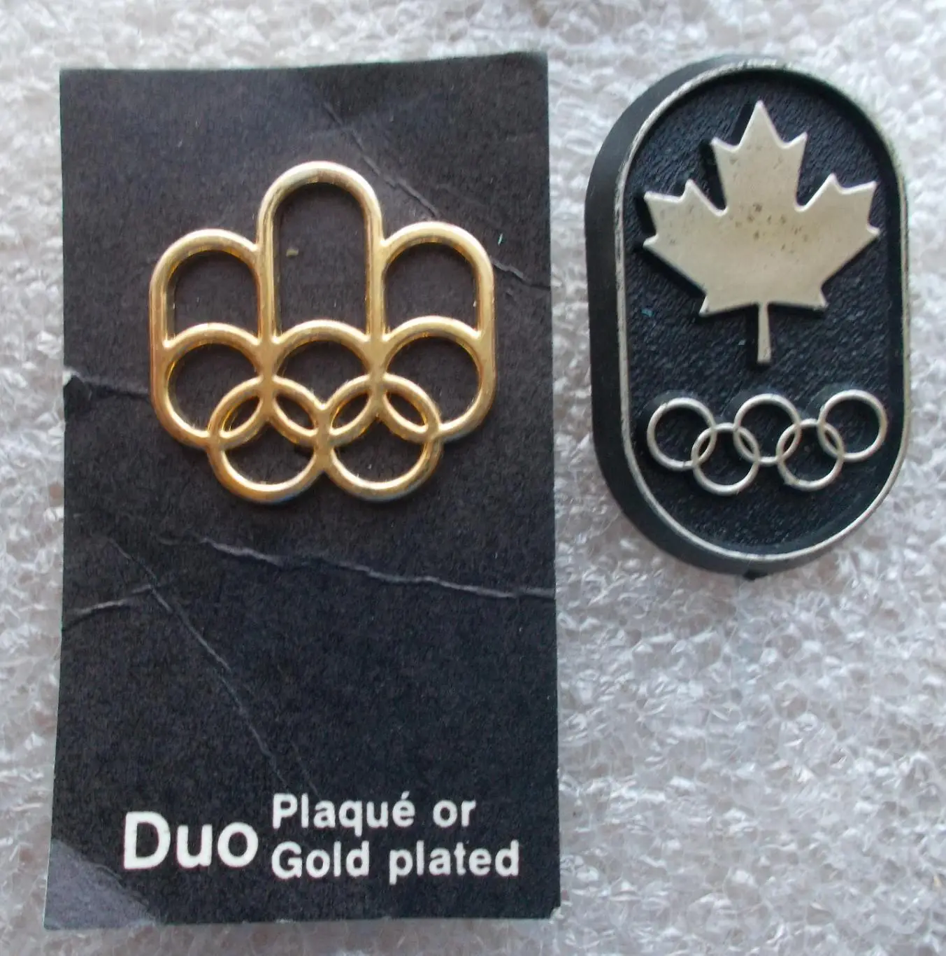 Олимпийские игры. Канада, Монреаль, 1976 год, логотип, золото, слева