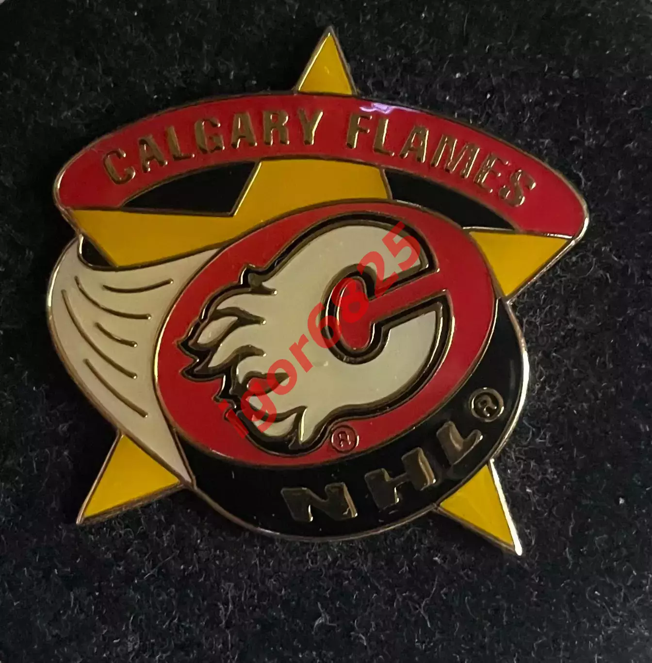 Хоккей. Знак Значок Калгари Флэймз НХЛ Calgary Flames NHL. Серия Звезда.