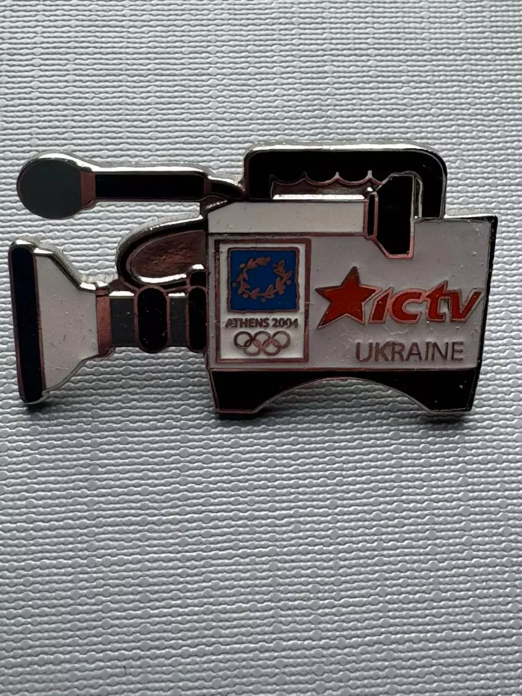 Акція до 31.03.2026..Значок. Олімпіада-2004. Україна ТБ..