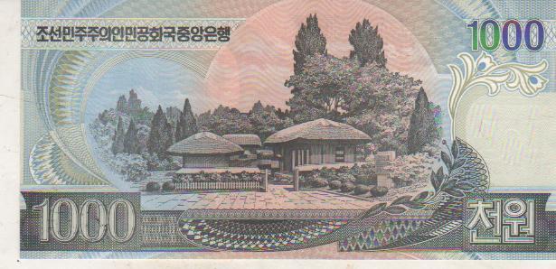 банкнота 1000 вон Северная Корея 2006г. №ZL 773988 пресс 1