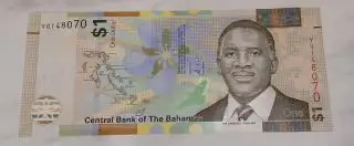 1 доллар.Багамские острова