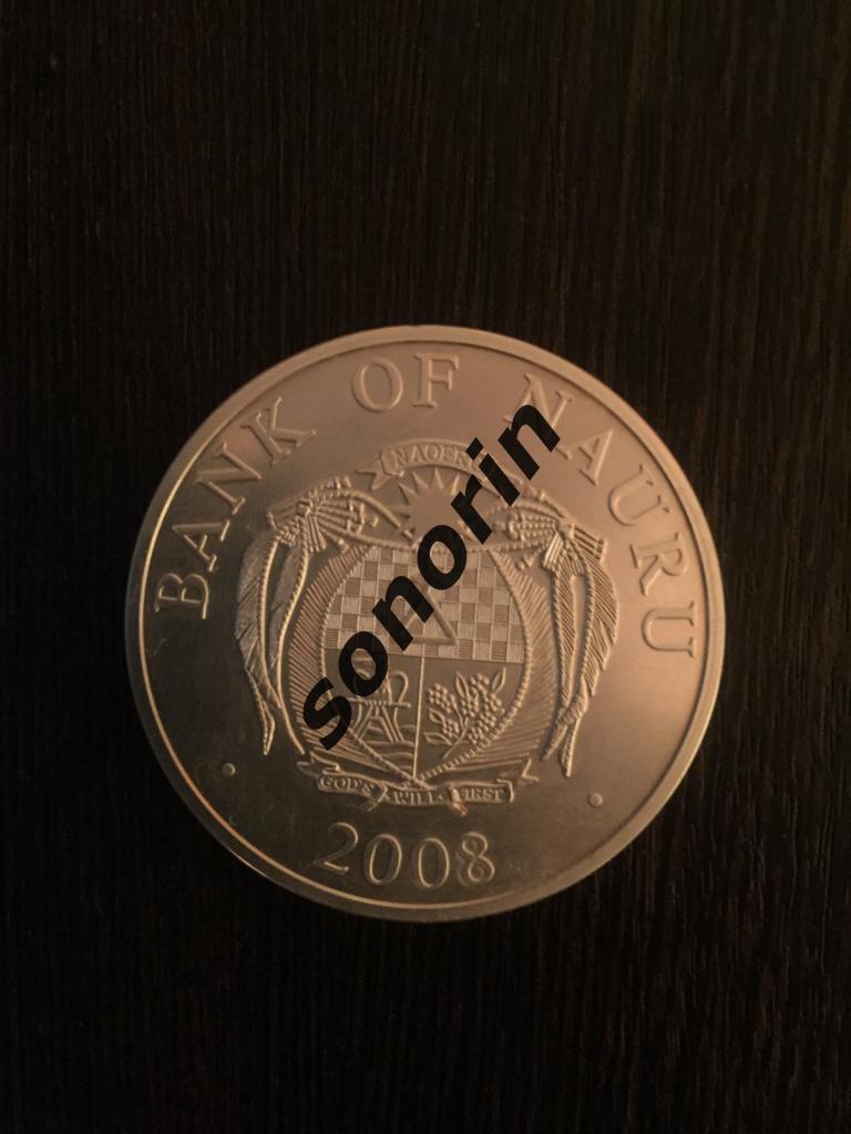 Австралийский доллар. 2008 год. Номинал 10. Серебряная монета Дед Мороз с гербом 1