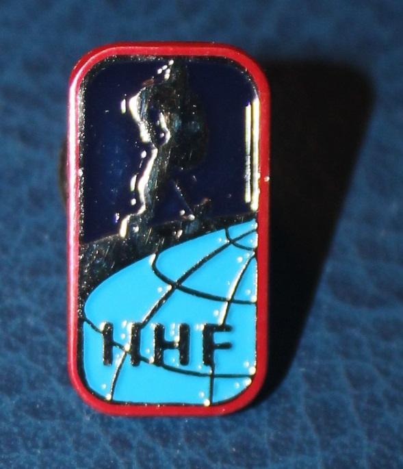 Официальный знак Международной федерации хоккея (ИИХФ)