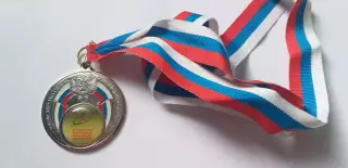 футбольная медаль ...2014 год....Третья спартакиада....