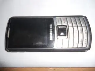 Телефон Самсунг б/у.