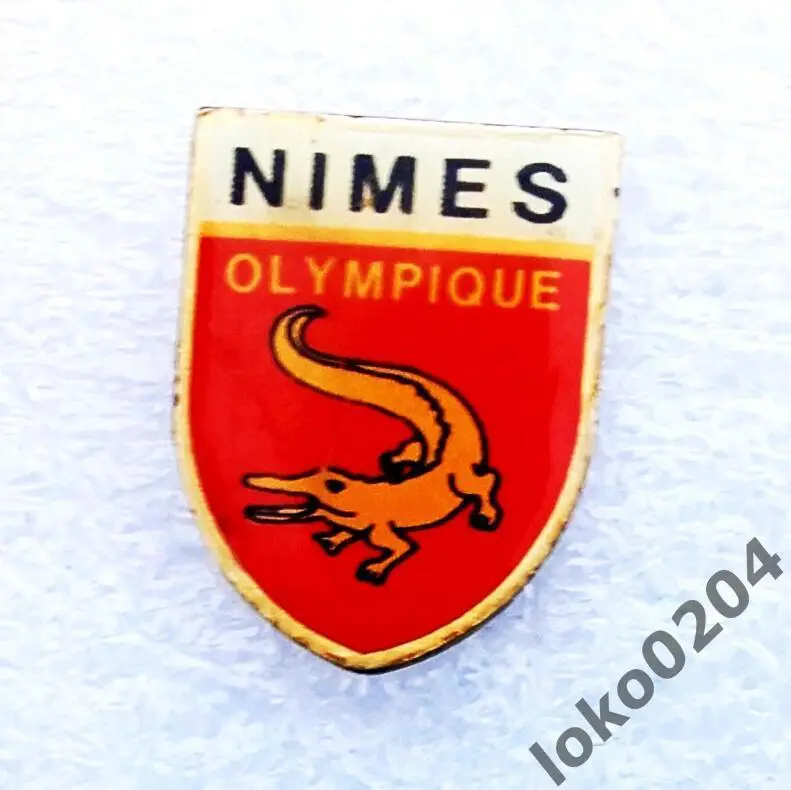Знак - Ф.К. НИМ - ФРАНЦИЯ.