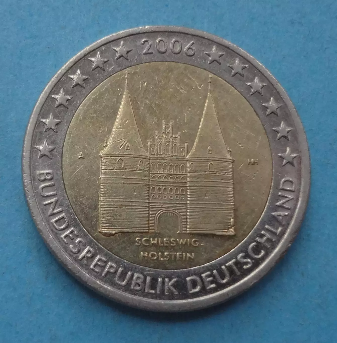 2 евро 2006 год Германия Шлезвиг-Гольштейн Голштинские ворота в Любеке (60)