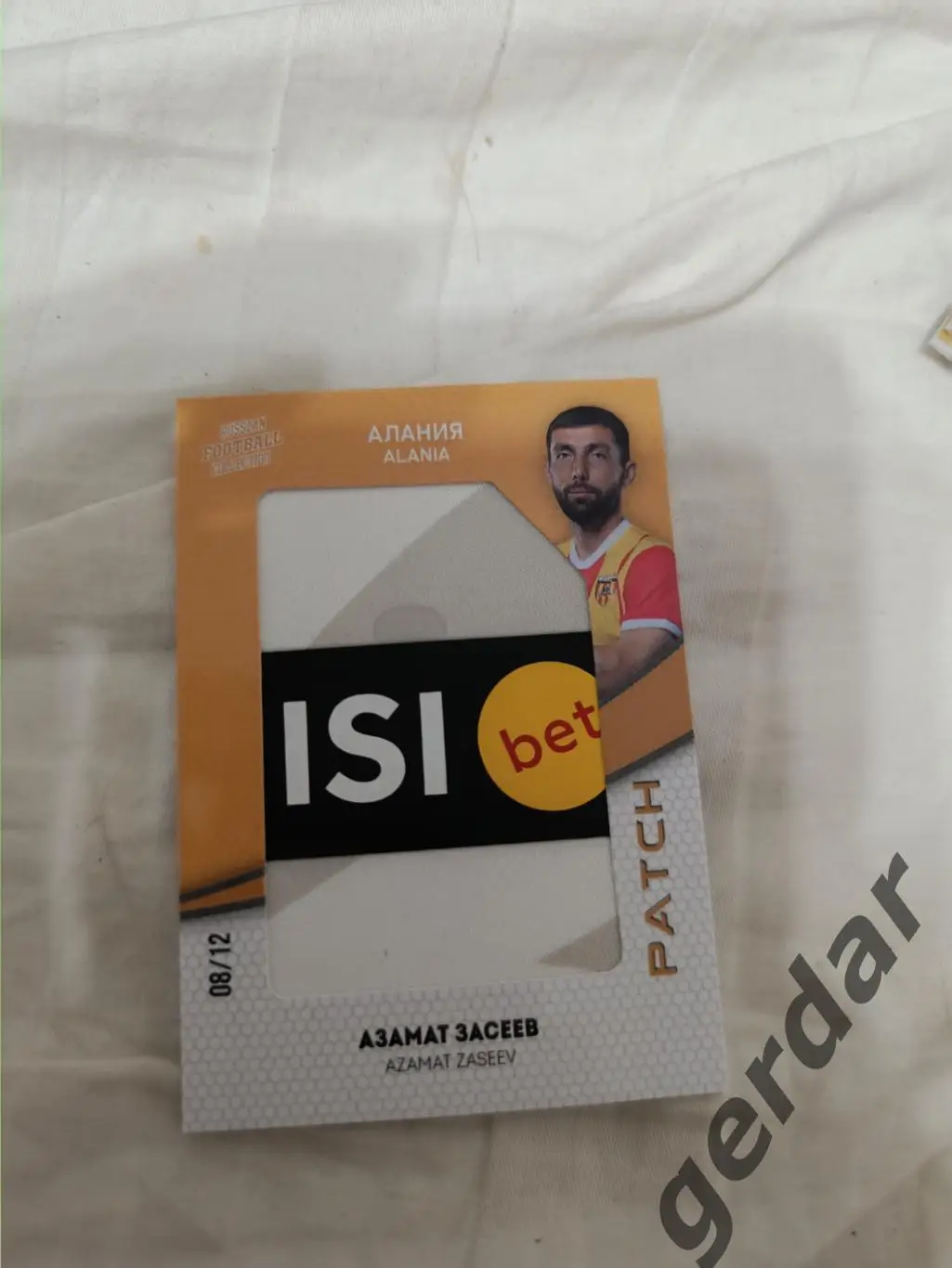 Азамат засеев Алания Владикавказ. карта с куском игровой джерси