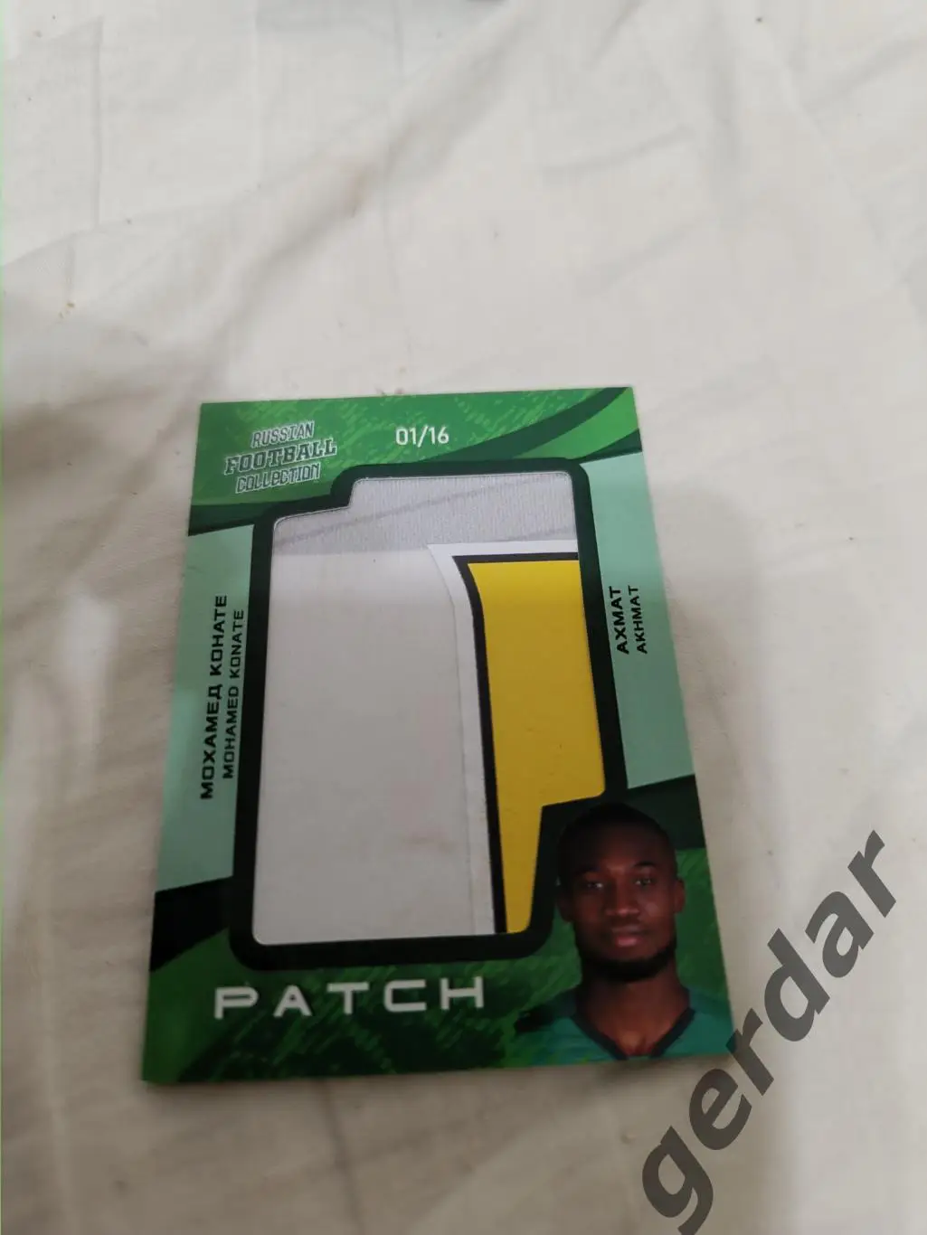 Мохаммед конате ахмат грозный .карта с куском игровой джерси