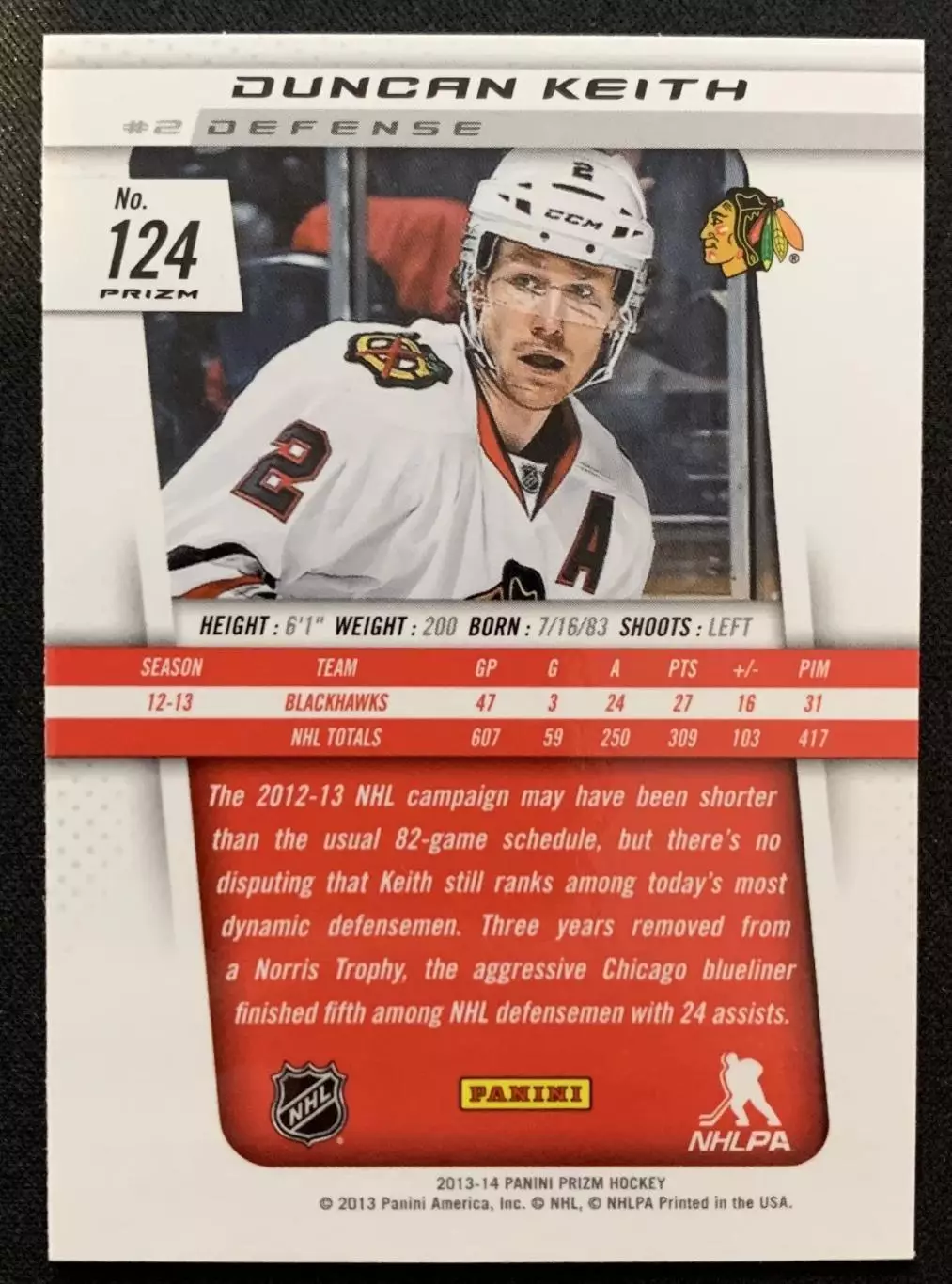 2013-14 Panini Prizm Prizms Green #124 Duncan Keith 1