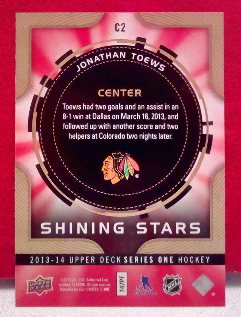 2013-14 Upper Deck Shining Stars Centers #C2 Jonathan Toews (NHL) Chicago Blackh 1