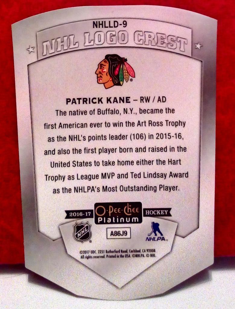 2016-17 O-Pee-Chee Platinum NHL Logo Crest Die Cuts #NHLLD9 Patrick Kane (NHL) C 1
