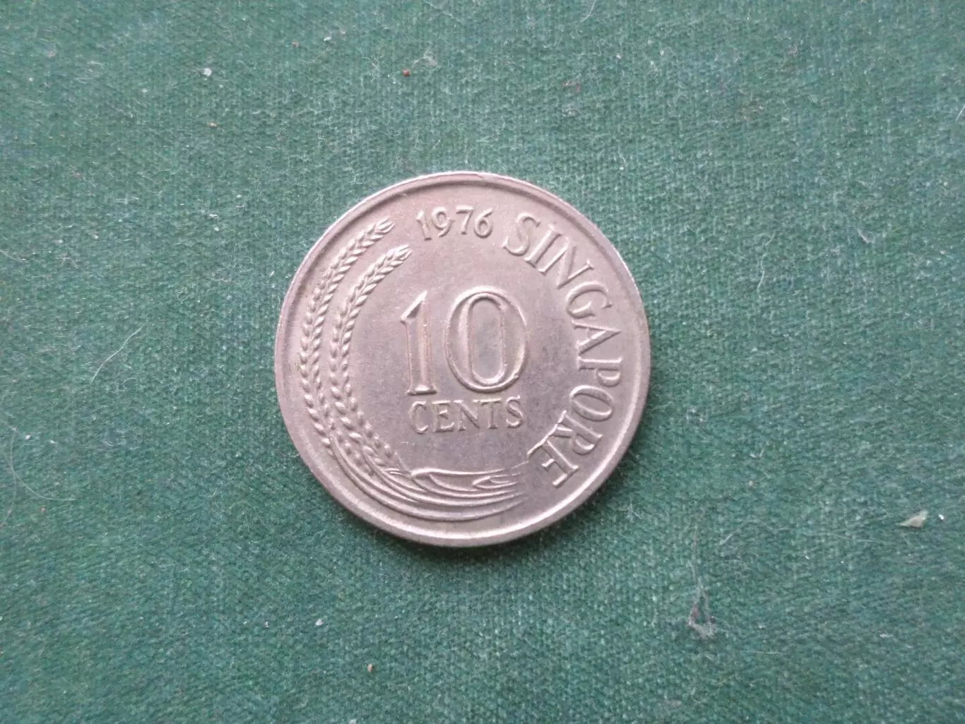 Монета 10 центов Сингапур 1976 г