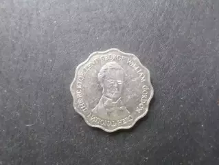 монета 10 долларов Ямайки 2005 г