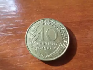 Монета 10 сантимов Франция 1987 г