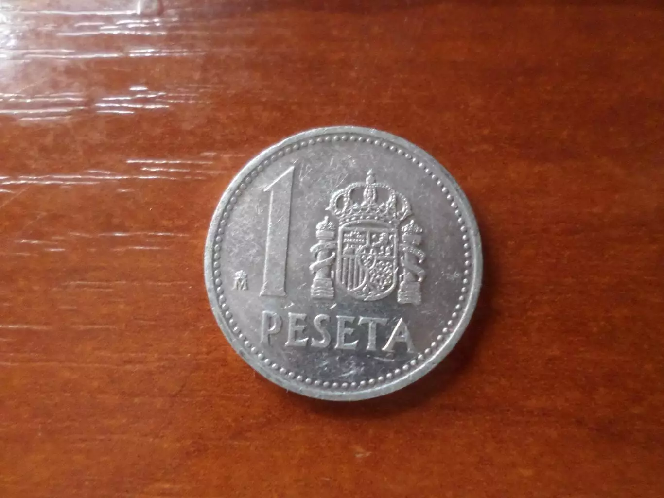 Монета 1 песета испания 1987 г