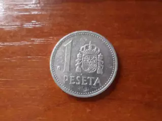 Монета 1 песета испания 1987 г