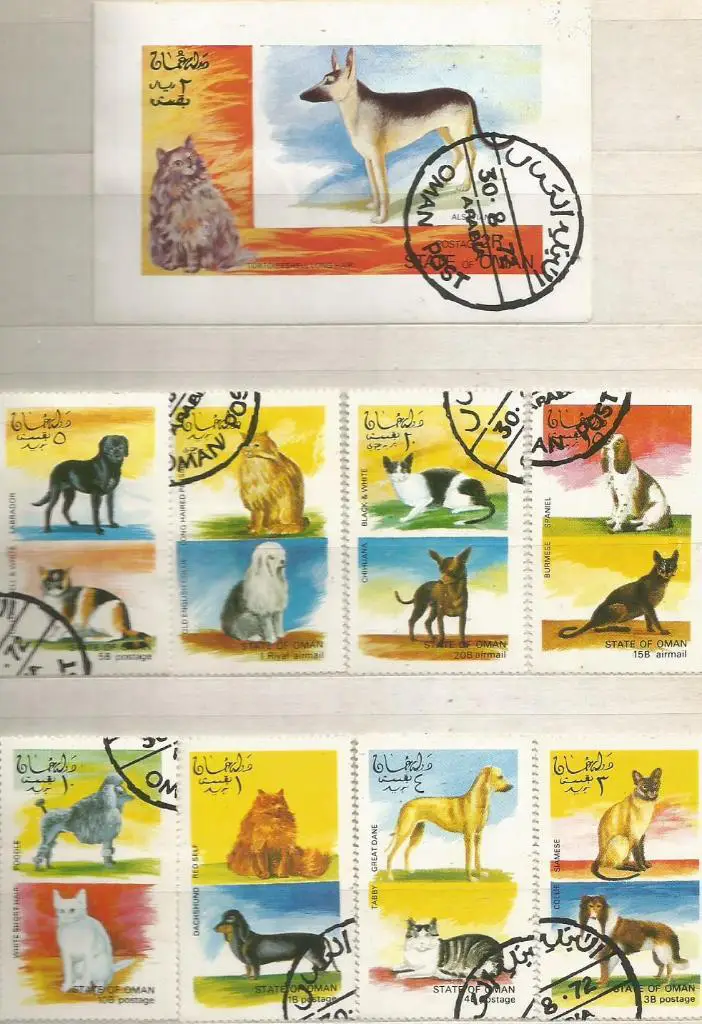 Марки: Кошки и собаки. Блок + 8 марок. Оман