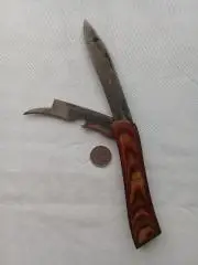 Нож раскладной. Лезвие, открывалки. С деревянной ручкой.