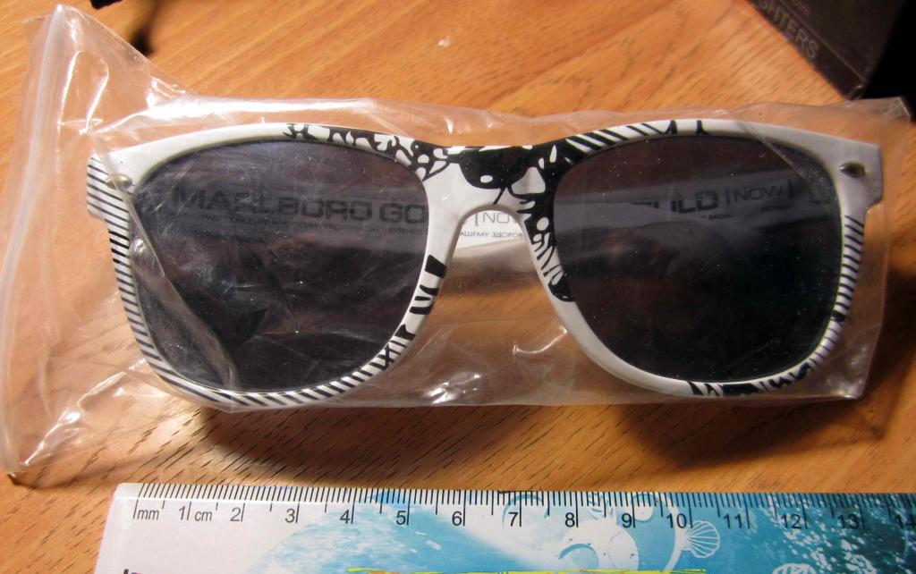 Новые солнцезащитные очки от Marlboro, в матерчатом чехле. Пластик 1