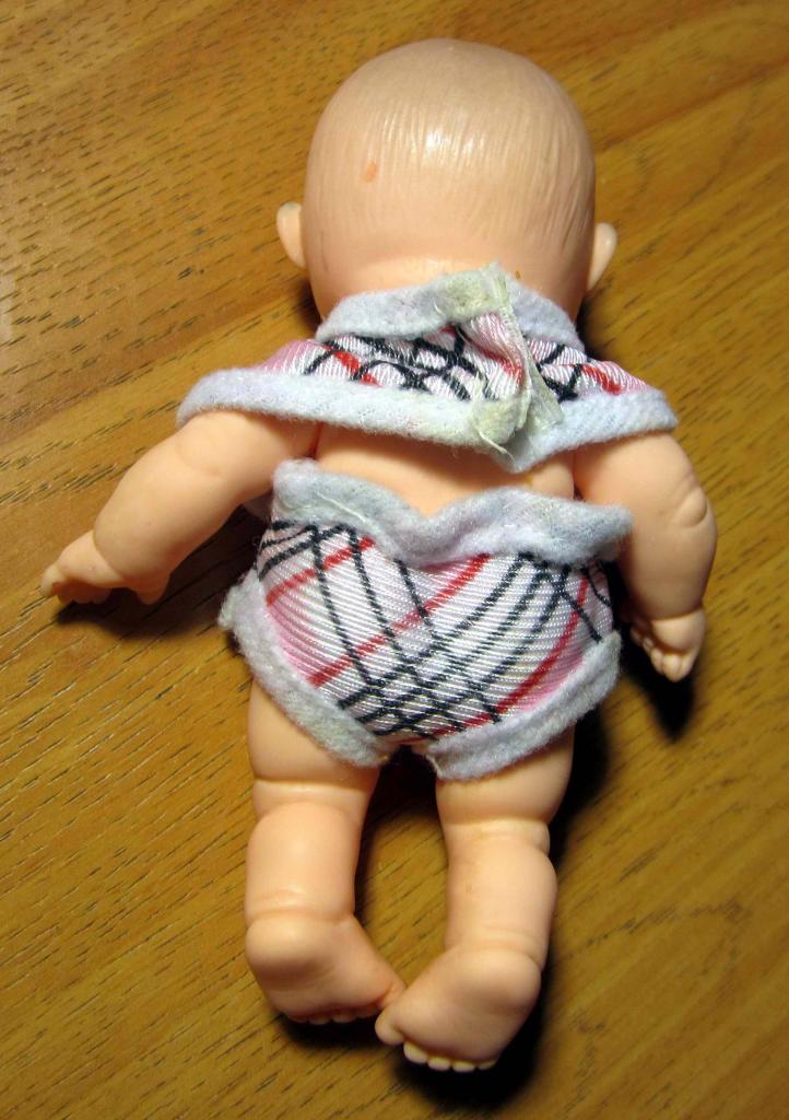 Кукла пупс в слюнявчике. 12 см 1