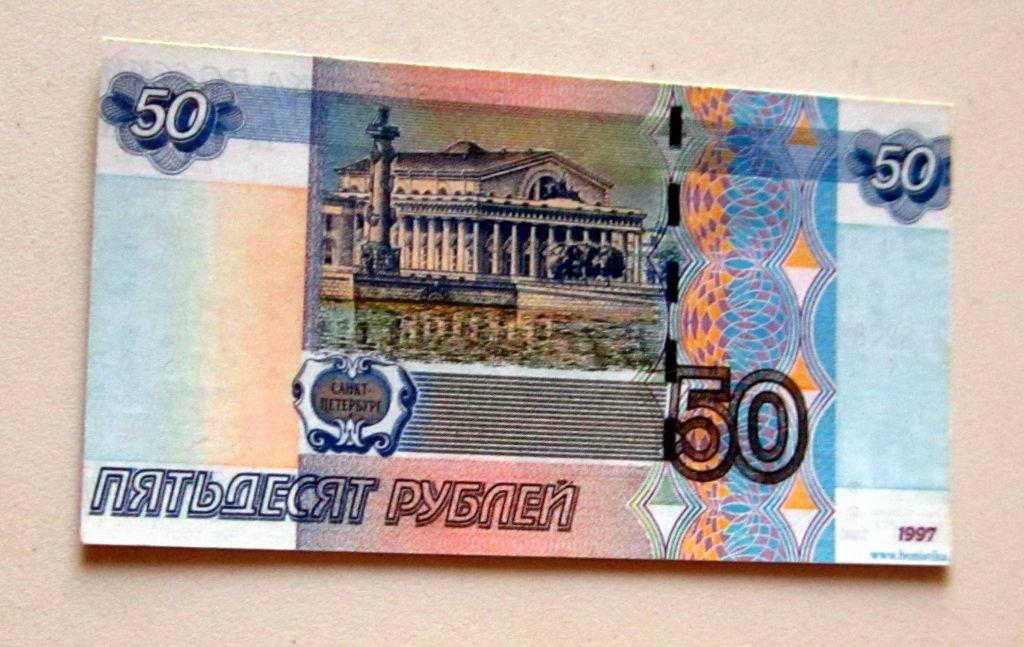 Визитка-реклама Такси Лорд. 50 рублей. Жесткий пластик